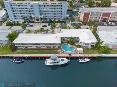 BRING YOUR BOAT to this wonderful hidden gem on deep water in on Coral Ridge Country Club in Florida - for sale on GolfHomes.com, golf home, golf lot
