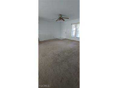 This cozy 3 bedroom, 2 bathroom pool home located in SW Cape on Royal Tee Country Club in Florida - for sale on GolfHomes.com, golf home, golf lot