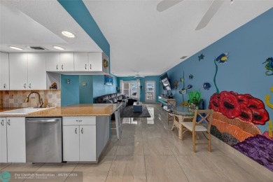 BRING YOUR BOAT to this wonderful hidden gem on deep water in on Coral Ridge Country Club in Florida - for sale on GolfHomes.com, golf home, golf lot