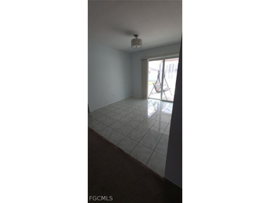 This cozy 3 bedroom, 2 bathroom pool home located in SW Cape on Royal Tee Country Club in Florida - for sale on GolfHomes.com, golf home, golf lot