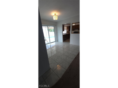 This cozy 3 bedroom, 2 bathroom pool home located in SW Cape on Royal Tee Country Club in Florida - for sale on GolfHomes.com, golf home, golf lot