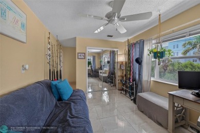 BRING YOUR BOAT to this wonderful hidden gem on deep water in on Coral Ridge Country Club in Florida - for sale on GolfHomes.com, golf home, golf lot