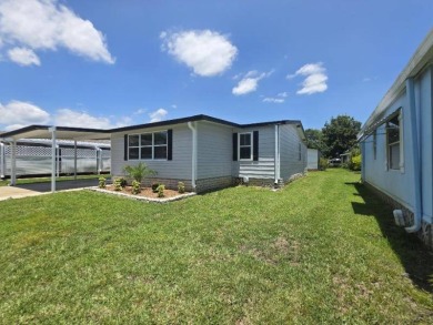 This stunning remodeled 3 spacious bedroom, 2 fully updated on Lakes at Leesburg Golf Course in Florida - for sale on GolfHomes.com, golf home, golf lot