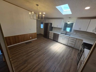 This stunning remodeled 3 spacious bedroom, 2 fully updated on Lakes at Leesburg Golf Course in Florida - for sale on GolfHomes.com, golf home, golf lot