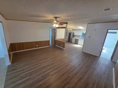 This stunning remodeled 3 spacious bedroom, 2 fully updated on Lakes at Leesburg Golf Course in Florida - for sale on GolfHomes.com, golf home, golf lot