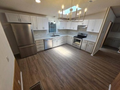 This stunning remodeled 3 spacious bedroom, 2 fully updated on Lakes at Leesburg Golf Course in Florida - for sale on GolfHomes.com, golf home, golf lot