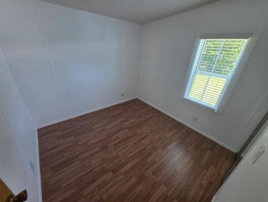 This stunning remodeled 3 spacious bedroom, 2 fully updated on Lakes at Leesburg Golf Course in Florida - for sale on GolfHomes.com, golf home, golf lot
