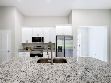 Brand new concrete block house with four (4) bedrooms, two (2) on Mirror Lakes Golf Club in Florida - for sale on GolfHomes.com, golf home, golf lot