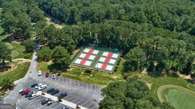 Start collecting lake-life stories before summer slips away on Turtle Cove Golf Course in Georgia - for sale on GolfHomes.com, golf home, golf lot