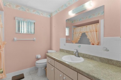 NEW ROOF 2022! Step into this charming 2 Bedroom, 2 Bath PECAN on The Links of Spruce Creek in Florida - for sale on GolfHomes.com, golf home, golf lot