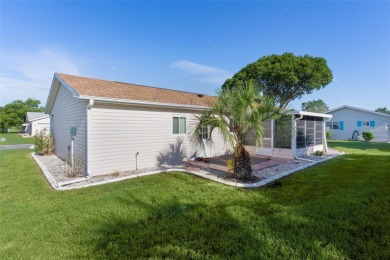 NEW ROOF 2022! Step into this charming 2 Bedroom, 2 Bath PECAN on The Links of Spruce Creek in Florida - for sale on GolfHomes.com, golf home, golf lot
