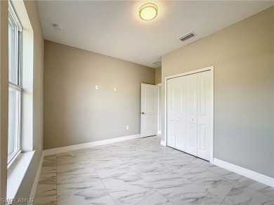 Brand new concrete block house with four (4) bedrooms, two (2) on Mirror Lakes Golf Club in Florida - for sale on GolfHomes.com, golf home, golf lot