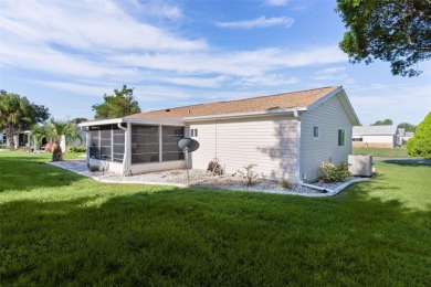 NEW ROOF 2022! Step into this charming 2 Bedroom, 2 Bath PECAN on The Links of Spruce Creek in Florida - for sale on GolfHomes.com, golf home, golf lot