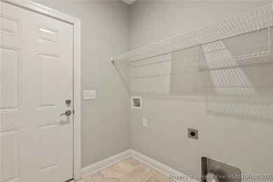 Adorable home located in the gated and golf community located in on Carolina Trace Country Club in North Carolina - for sale on GolfHomes.com, golf home, golf lot