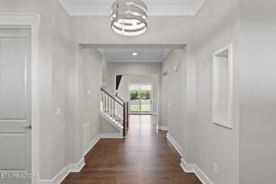 This craftsman style home features 4 bedrooms and 3.5 bathrooms on Tennessee National Golf Club in Tennessee - for sale on GolfHomes.com, golf home, golf lot