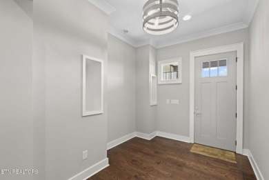 This craftsman style home features 4 bedrooms and 3.5 bathrooms on Tennessee National Golf Club in Tennessee - for sale on GolfHomes.com, golf home, golf lot