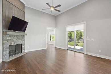 This craftsman style home features 4 bedrooms and 3.5 bathrooms on Tennessee National Golf Club in Tennessee - for sale on GolfHomes.com, golf home, golf lot