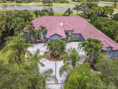 Wonderful open floor plan built on cul-de-sac overlooking wide on PGA National Estates Golf Course in Florida - for sale on GolfHomes.com, golf home, golf lot