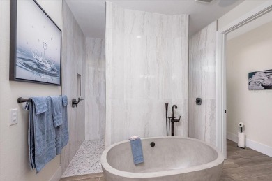 Luxuriously Modern Waterfront Masterpiece in Prestigious Punta on Saint Andrews South Golf Club in Florida - for sale on GolfHomes.com, golf home, golf lot