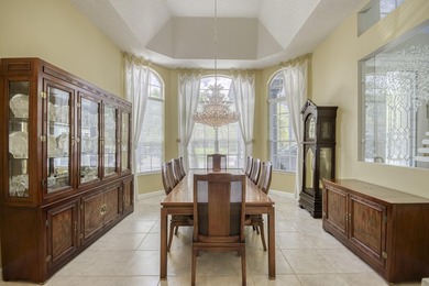 Wonderful open floor plan built on cul-de-sac overlooking wide on PGA National Estates Golf Course in Florida - for sale on GolfHomes.com, golf home, golf lot