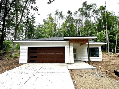 Welcome home to this brand new Andrew Ulberg Builders ranch in on Canadian Lakes Country Club-The Royal Course in Michigan - for sale on GolfHomes.com, golf home, golf lot