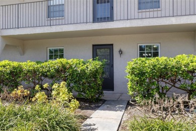 Effortless living starts here! Attractive ground-floor unit on Bayou Golf Club in Florida - for sale on GolfHomes.com, golf home, golf lot