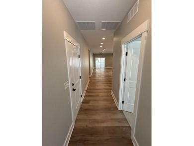Welcome home to this brand new Andrew Ulberg Builders ranch in on Canadian Lakes Country Club-The Royal Course in Michigan - for sale on GolfHomes.com, golf home, golf lot