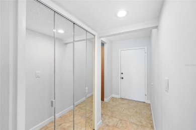 Effortless living starts here! Attractive ground-floor unit on Bayou Golf Club in Florida - for sale on GolfHomes.com, golf home, golf lot