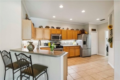 Enjoy the Florida lifestyle in this exquisite 2 bedroom 2 bath + on Heron Creek Golf and Country Club in Florida - for sale on GolfHomes.com, golf home, golf lot