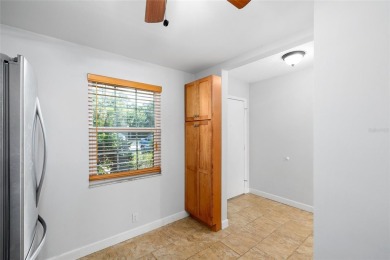 Effortless living starts here! Attractive ground-floor unit on Bayou Golf Club in Florida - for sale on GolfHomes.com, golf home, golf lot