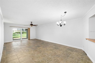 Effortless living starts here! Attractive ground-floor unit on Bayou Golf Club in Florida - for sale on GolfHomes.com, golf home, golf lot