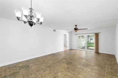 Effortless living starts here! Attractive ground-floor unit on Bayou Golf Club in Florida - for sale on GolfHomes.com, golf home, golf lot