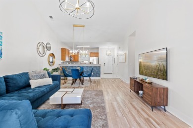 Modern and fully furnished 2 bed, 2 bath top-floor unit in on Barefoot Resort and Golf Club  in South Carolina - for sale on GolfHomes.com, golf home, golf lot
