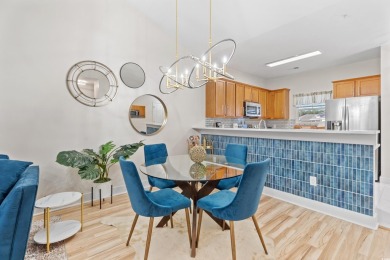 Modern and fully furnished 2 bed, 2 bath top-floor unit in on Barefoot Resort and Golf Club  in South Carolina - for sale on GolfHomes.com, golf home, golf lot