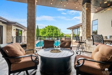 Welcome to this exceptional 5-bedroom, 5-bathroom executive home on Colbert Hills Golf Course in Kansas - for sale on GolfHomes.com, golf home, golf lot
