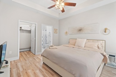 Modern and fully furnished 2 bed, 2 bath top-floor unit in on Barefoot Resort and Golf Club  in South Carolina - for sale on GolfHomes.com, golf home, golf lot
