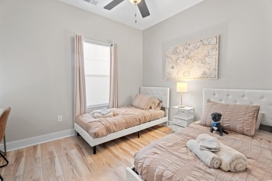 Modern and fully furnished 2 bed, 2 bath top-floor unit in on Barefoot Resort and Golf Club  in South Carolina - for sale on GolfHomes.com, golf home, golf lot