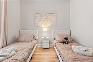 Modern and fully furnished 2 bed, 2 bath top-floor unit in on Barefoot Resort and Golf Club  in South Carolina - for sale on GolfHomes.com, golf home, golf lot