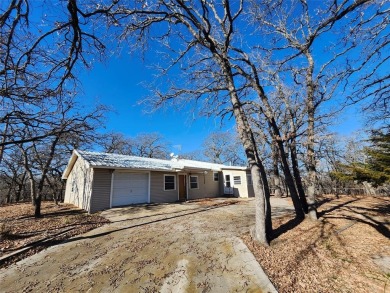 INVESTMENT!!INVESTMENT!! This home has Great bones and is ready on Nocona Hills Golf Course in Texas - for sale on GolfHomes.com, golf home, golf lot