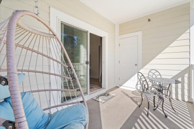 Modern and fully furnished 2 bed, 2 bath top-floor unit in on Barefoot Resort and Golf Club  in South Carolina - for sale on GolfHomes.com, golf home, golf lot