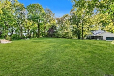 Welcome to 7 Tudor Lane in Sands Point, Where Serenity Meets on Sands Point Golf Club in New York - for sale on GolfHomes.com, golf home, golf lot