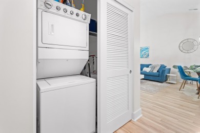 Modern and fully furnished 2 bed, 2 bath top-floor unit in on Barefoot Resort and Golf Club  in South Carolina - for sale on GolfHomes.com, golf home, golf lot
