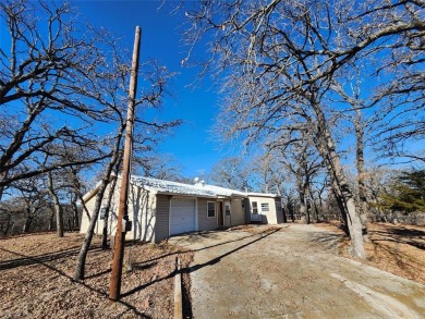 INVESTMENT!!INVESTMENT!! This home has Great bones and is ready on Nocona Hills Golf Course in Texas - for sale on GolfHomes.com, golf home, golf lot