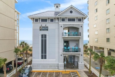 Modern and fully furnished 2 bed, 2 bath top-floor unit in on Barefoot Resort and Golf Club  in South Carolina - for sale on GolfHomes.com, golf home, golf lot