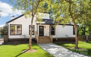 Fully renovated in 2025, this stunning Tega Cay home blends on Tega Cay Golf Club in South Carolina - for sale on GolfHomes.com, golf home, golf lot