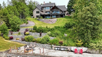 This well-maintained 6848 SF home in Sandpoint's premier on Sandpoint Elks Golf Course in Idaho - for sale on GolfHomes.com, golf home, golf lot