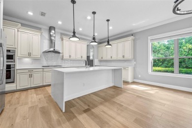 Luxury, Location, and Lifestyle--All in One Exceptional Home!
 on Heathrow Country Club in Florida - for sale on GolfHomes.com, golf home, golf lot