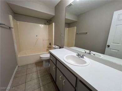 Spacious 3-bedroom, 2-bath, 2-car garage pool home in the heart on Estero Country Club in Florida - for sale on GolfHomes.com, golf home, golf lot