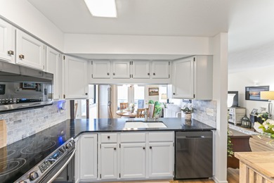 Located along the 13th and 14th fairways, this townhome offers on Pointe Royale Village Country Club in Missouri - for sale on GolfHomes.com, golf home, golf lot