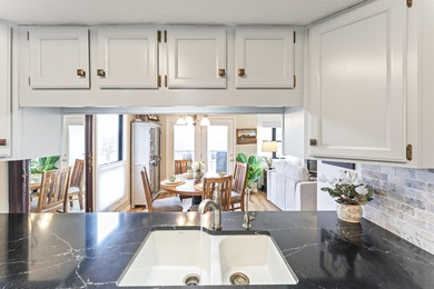 Located along the 13th and 14th fairways, this townhome offers on Pointe Royale Village Country Club in Missouri - for sale on GolfHomes.com, golf home, golf lot